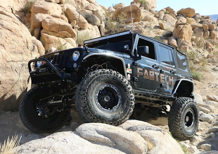 Fabtech Flagship: Battleship Jeep Wrangler Unlimited JK Build | DrivingLine