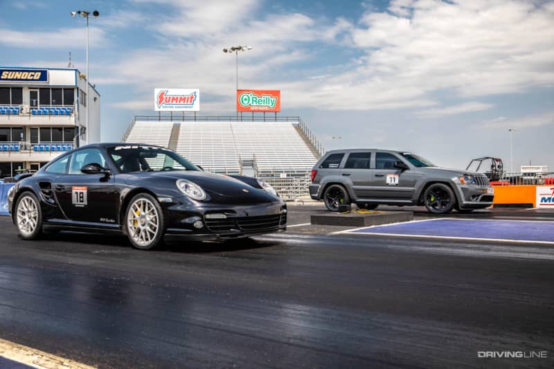 Jeep Grand Cherokee SRT8 vs Porsche 911 Turbo | Driver Battles: Drag  Edition | DrivingLine